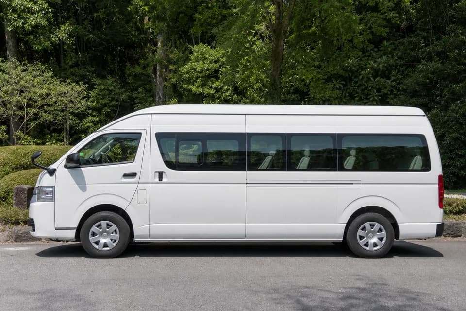 14-seat Hiace or equivalent